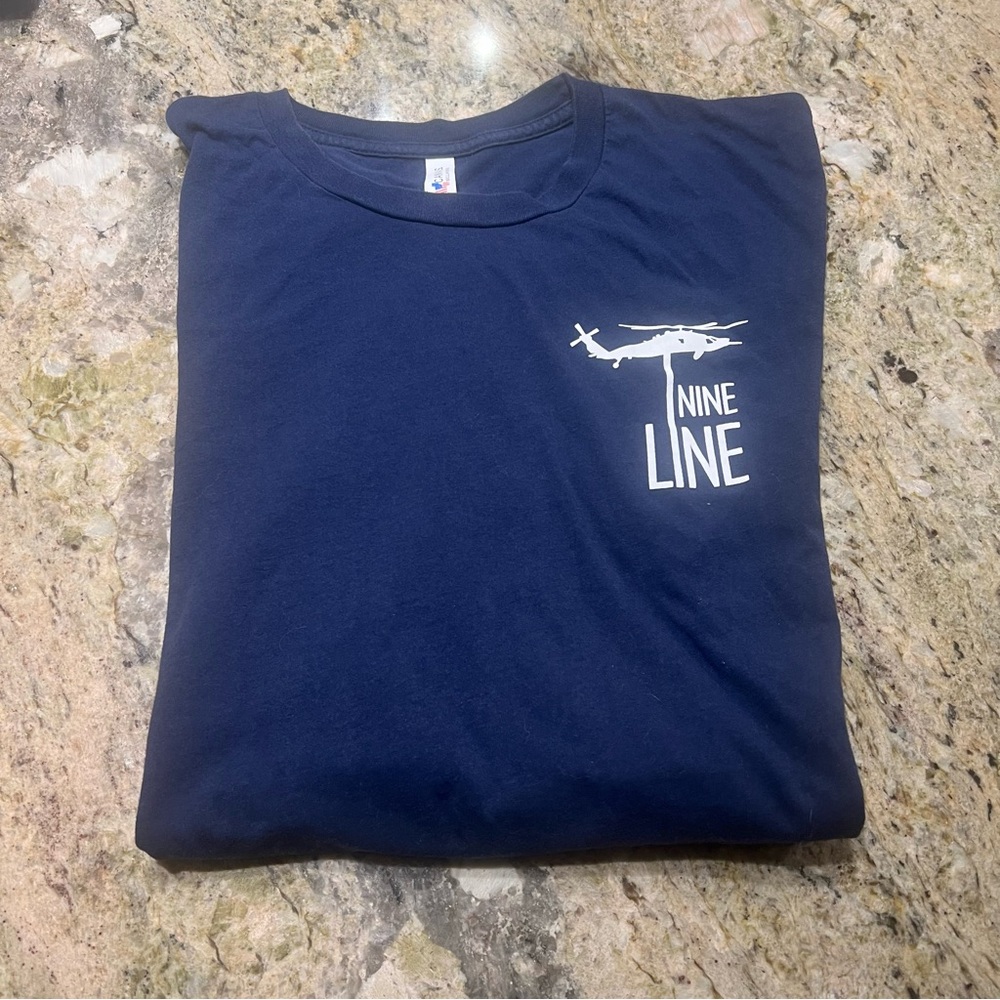 Nine Line Deep Blue T-Shirt. Size XXL American print on back.